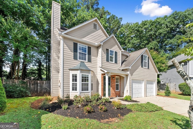 4015 Snowshoe Ct NW, Acworth, GA 30101 - traditional home with a chimney, driveway, and an attached garage