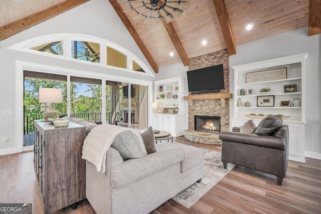 123 River Point Rd, Jackson, GA 30233 - living room with a fireplace, a wood ceiling with exposed beams, high vaulted ceiling, wood finished floors, and ceiling fan