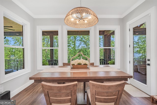 123 River Point Rd, Jackson, GA 30233 - dining space with plenty of natural light, a chandelier, wood finished floors, and crown molding