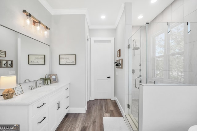 123 River Point Rd, Jackson, GA 30233 - bathroom with vanity, crown molding, a stall shower, wood finished floors, and recessed lighting