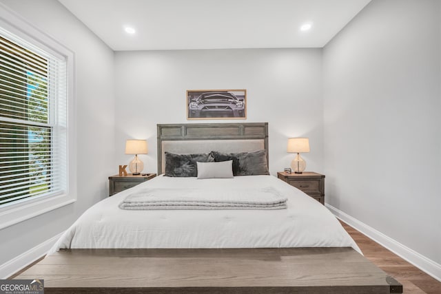 123 River Point Rd, Jackson, GA 30233 - bedroom with wood finished floors and recessed lighting