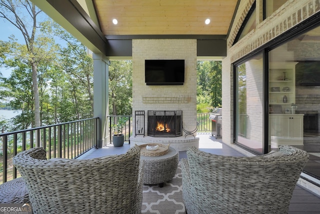 123 River Point Rd, Jackson, GA 30233 - view of patio / terrace with an outdoor brick fireplace and a grill