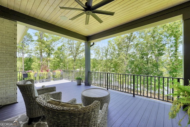 123 River Point Rd, Jackson, GA 30233 - wooden terrace featuring ceiling fan and view of wooded area