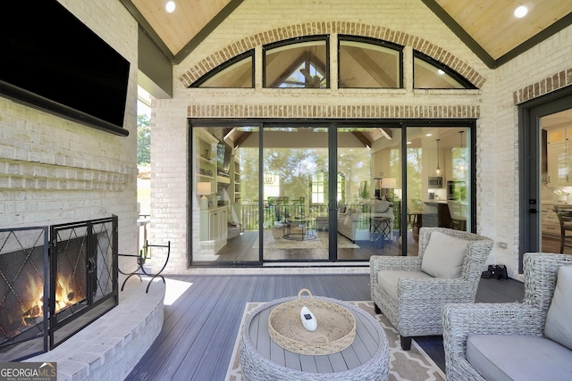 123 River Point Rd, Jackson, GA 30233 - wooden deck featuring an outdoor brick fireplace