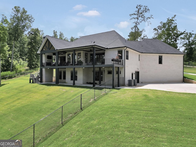 123 River Point Rd, Jackson, GA 30233 - rear view of house featuring a fenced backyard, a patio area, and roof with shingles