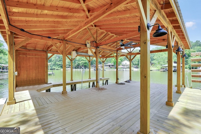 123 River Point Rd, Jackson, GA 30233 - dock featuring boat lift and a water view