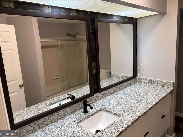 6353 Wedgeview Ct, Tucker, GA 30084 - bathroom with vanity and toilet