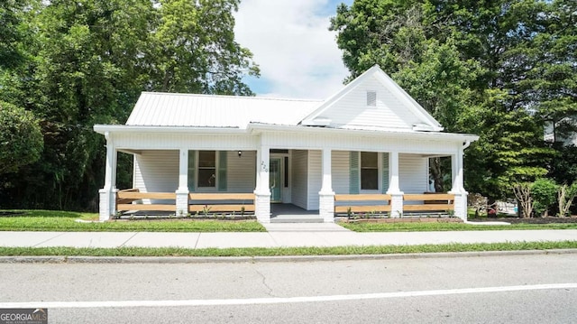220 Confederate Ave, Dallas, GA 30132 - view of front of property with a porch and a metal roof