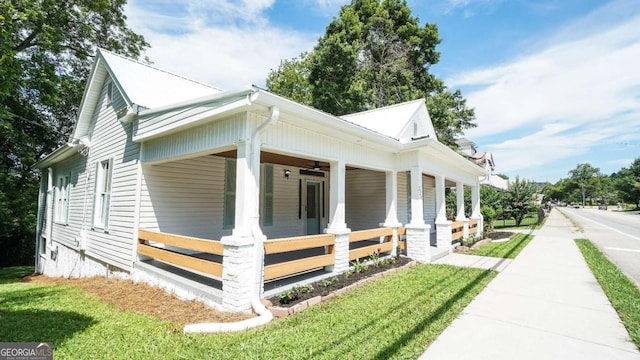 220 Confederate Ave, Dallas, GA 30132 - view of side of home featuring covered porch and a lawn