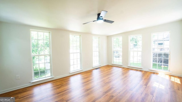 220 Confederate Ave, Dallas, GA 30132 - unfurnished room featuring wood finished floors, a ceiling fan, and vaulted ceiling