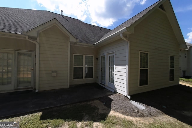 3858 Parham Way S, Fulton, GA 30349 - back of property featuring a patio area and a shingled roof