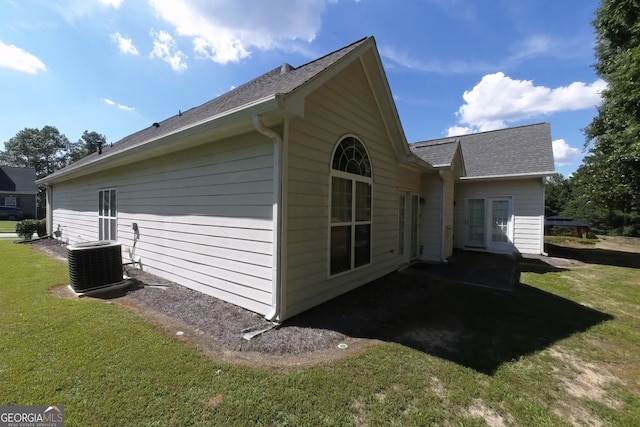 3858 Parham Way S, Fulton, GA 30349 - view of side of home featuring a central AC unit and a lawn