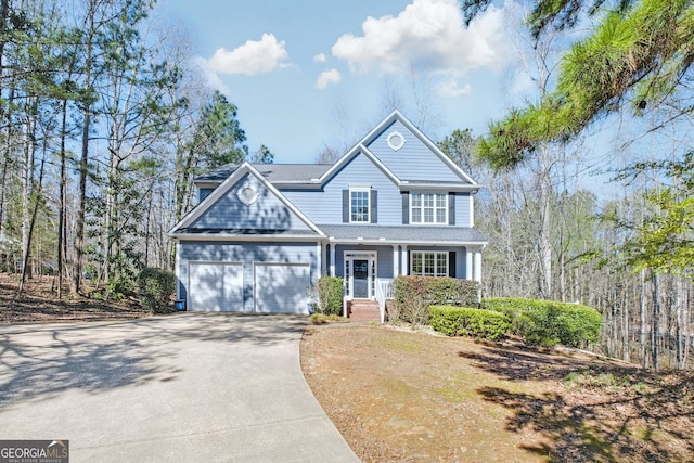 130 Sable Pointe Dr, Milton, GA 30004 - traditional home with concrete driveway, an attached garage, covered porch, and a shingled roof