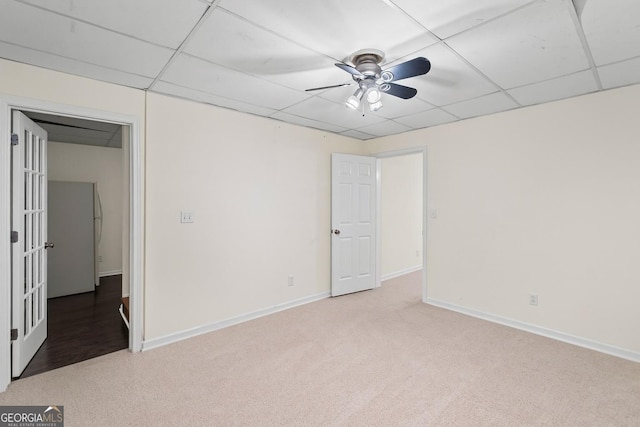 130 Sable Pointe Dr, Milton, GA 30004 - empty room with light carpet, a ceiling fan, and a drop ceiling