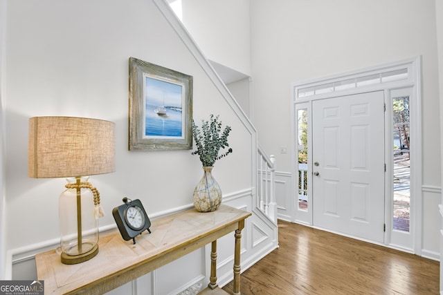 130 Sable Pointe Dr, Milton, GA 30004 - entrance foyer with stairs and wood finished floors