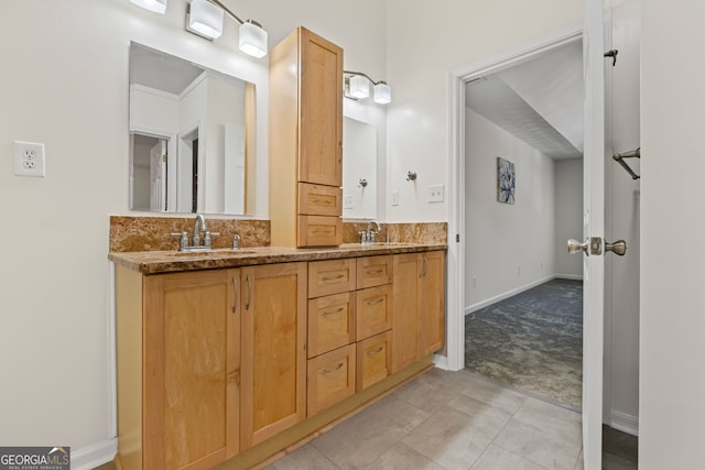 130 Sable Pointe Dr, Milton, GA 30004 - bathroom with double vanity and baseboards
