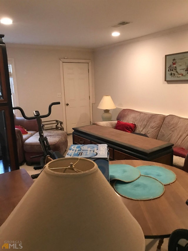 living room featuring ornamental molding