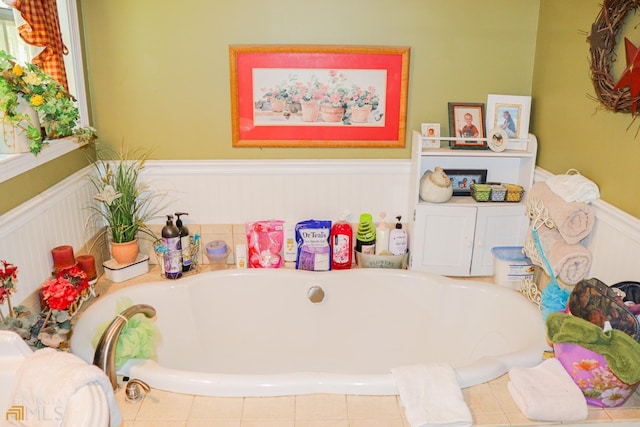 bathroom featuring a washtub