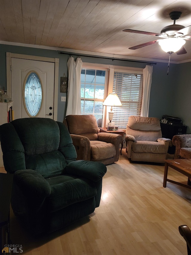 living room featuring wooden ceiling, light hardwood / wood-style floors, and ceiling fan