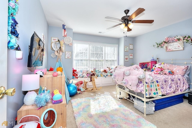 bedroom with light colored carpet and ceiling fan