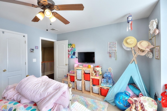 rec room with ceiling fan and light hardwood / wood-style flooring