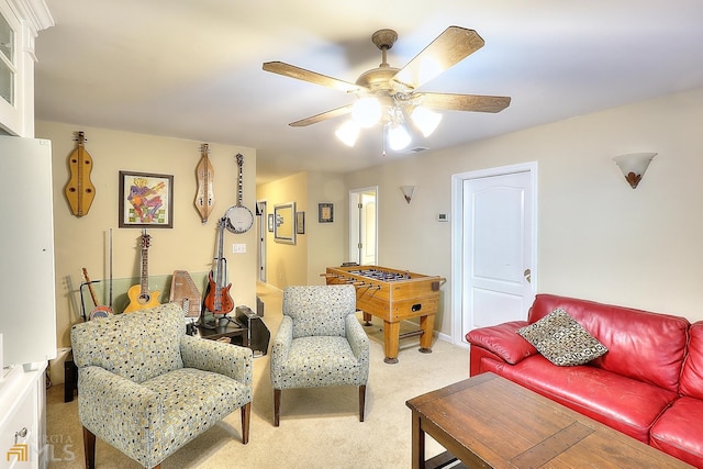 living room featuring ceiling fan and light colored carpet