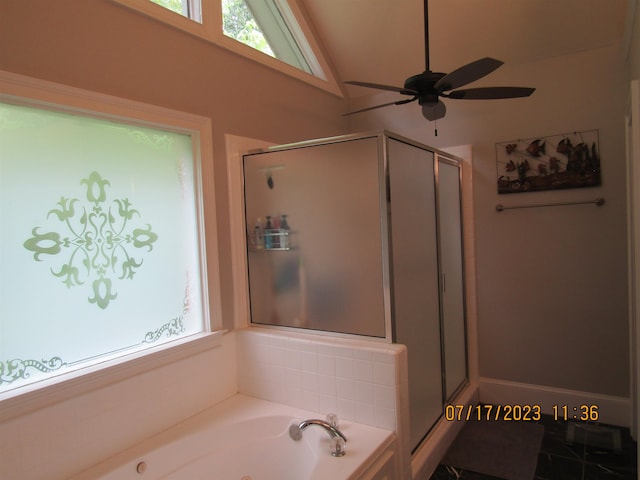 bathroom with shower with separate bathtub, ceiling fan, and lofted ceiling