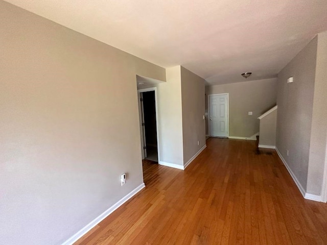 spare room featuring light wood-type flooring