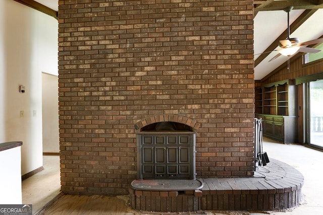 interior details featuring beamed ceiling, ceiling fan, and hardwood / wood-style floors