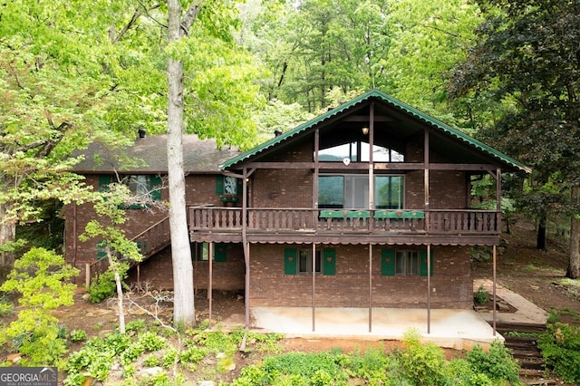 rear view of house with a patio area