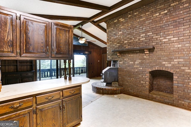 interior space featuring brick wall, light tile floors, and a textured ceiling