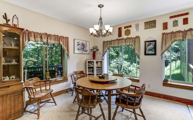 dining room featuring a chandelier