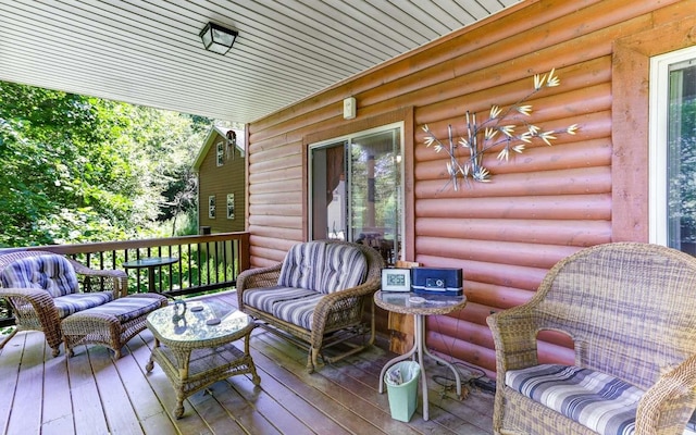 deck with an outdoor hangout area