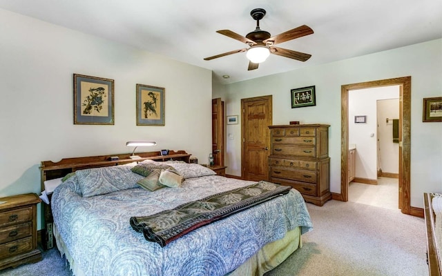 bedroom with ceiling fan and light colored carpet