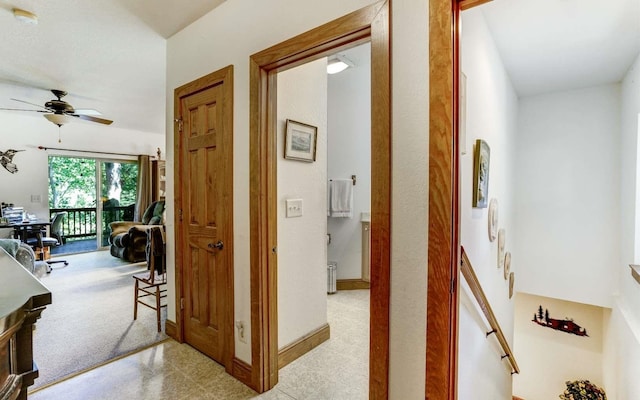 hall featuring light tile floors