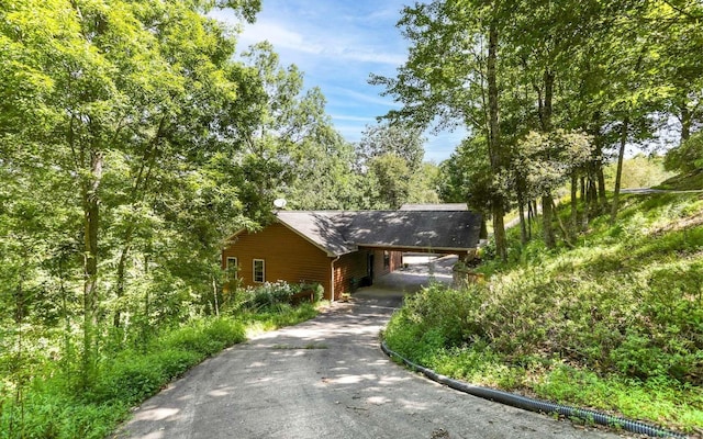 view of front of home with a carport