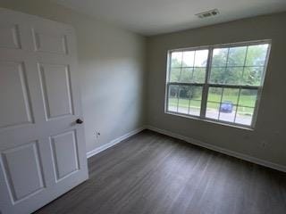 interior space with dark wood-type flooring