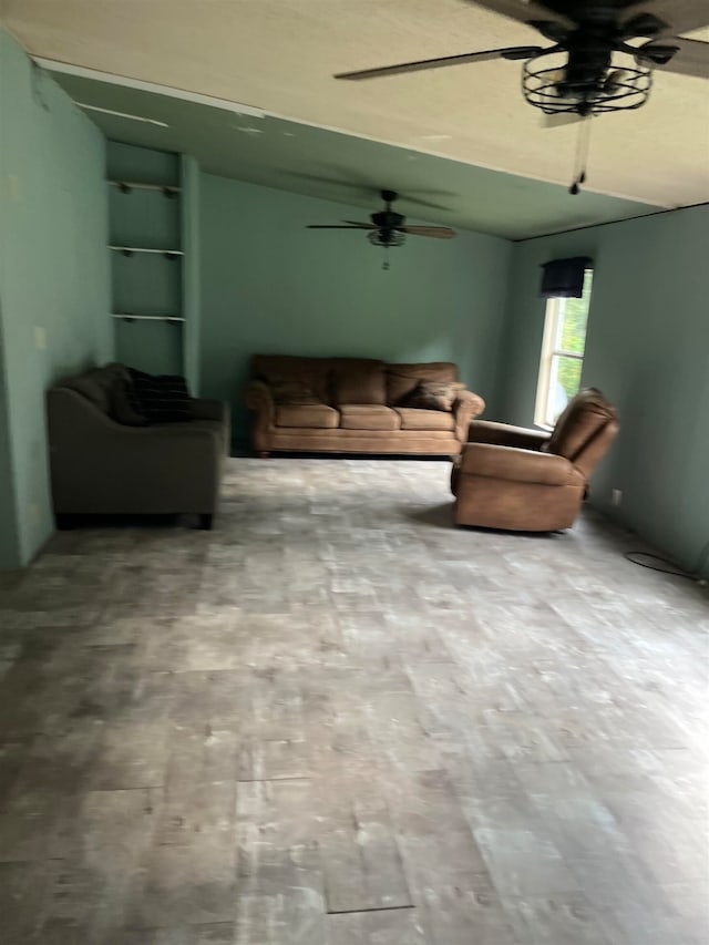 living room featuring ceiling fan