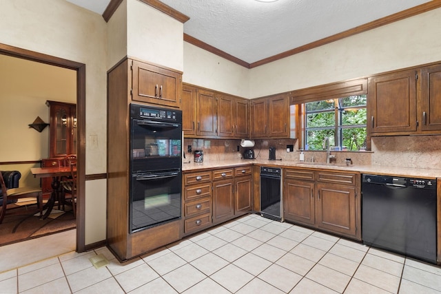 kitchen featuring tasteful backsplash, light tile flooring, and black appliances