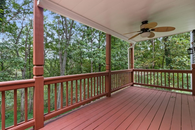 wooden terrace featuring ceiling fan