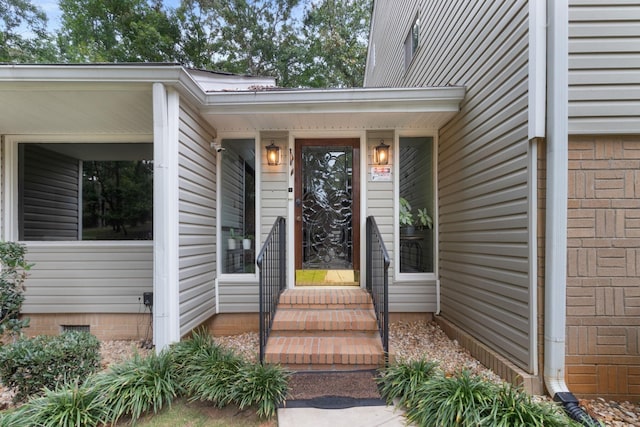 property entrance featuring covered porch