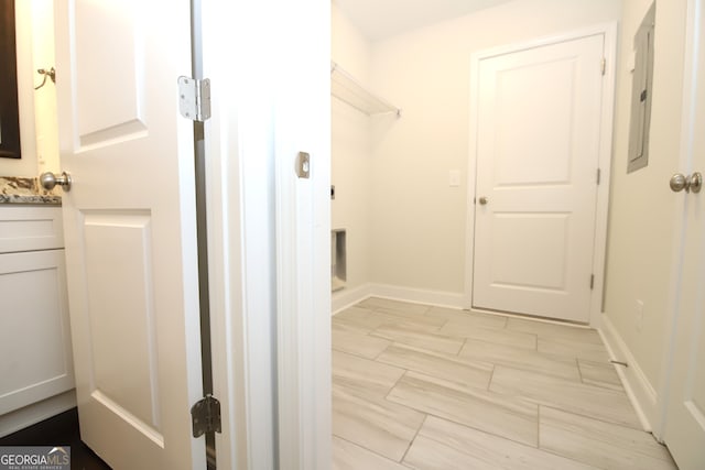 washroom with light tile floors