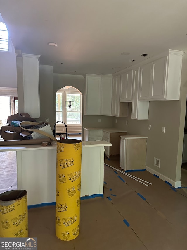 kitchen featuring white cabinetry and a kitchen island