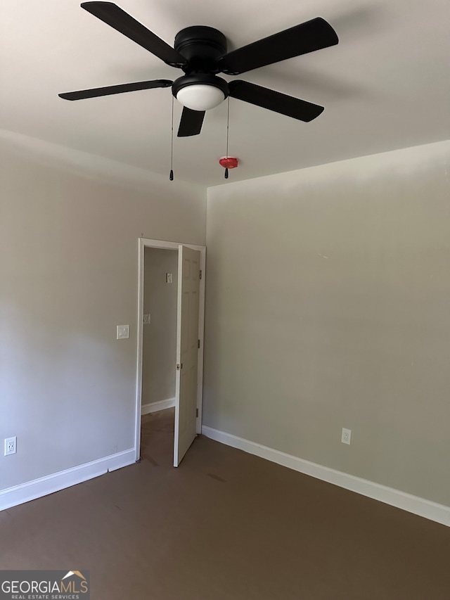 spare room with ceiling fan