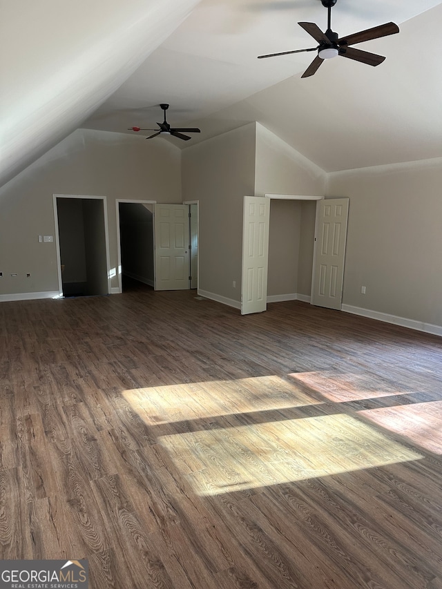 bonus room with dark hardwood / wood-style flooring, ceiling fan, and lofted ceiling