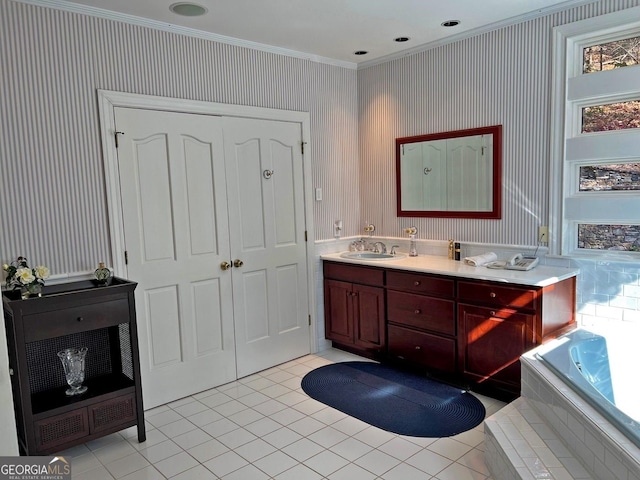 bathroom with vanity, tile floors, crown molding, and tiled bath