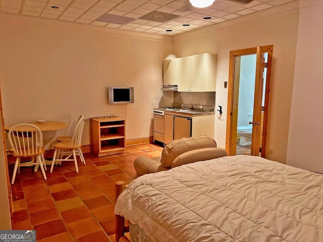 bedroom with dark tile flooring