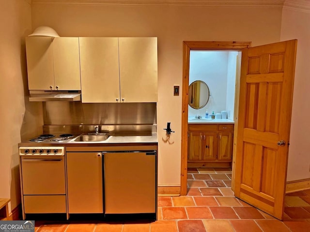 kitchen with premium range hood, light tile floors, crown molding, oven, and sink