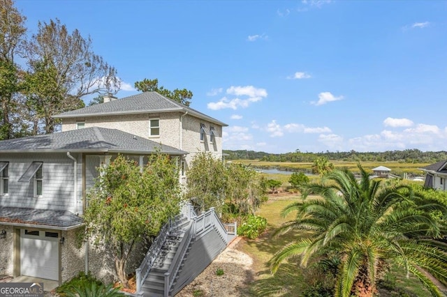 view of property exterior with a garage