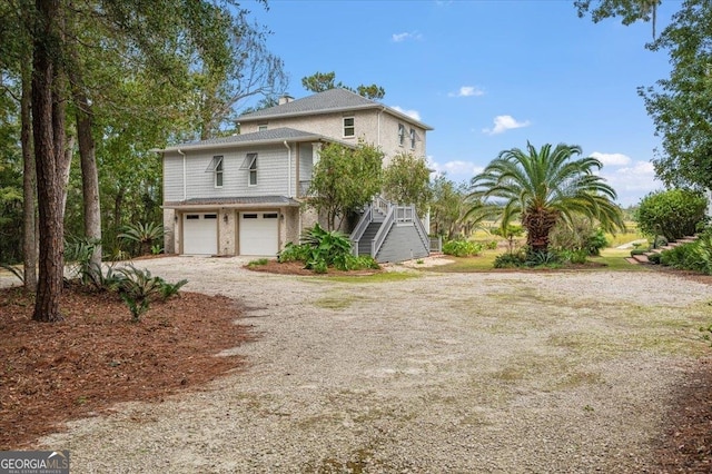 view of property with a garage